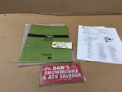Operator s Manual Issue D5 # OM-M66064 John Deere 300 - 400 Snowmobile