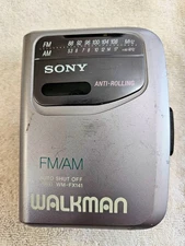VINTAGE SONY WM-FX141 AM/FM CASSETTE TAPE WALKMAN 90s ANTI-ROLLING PORTABLE