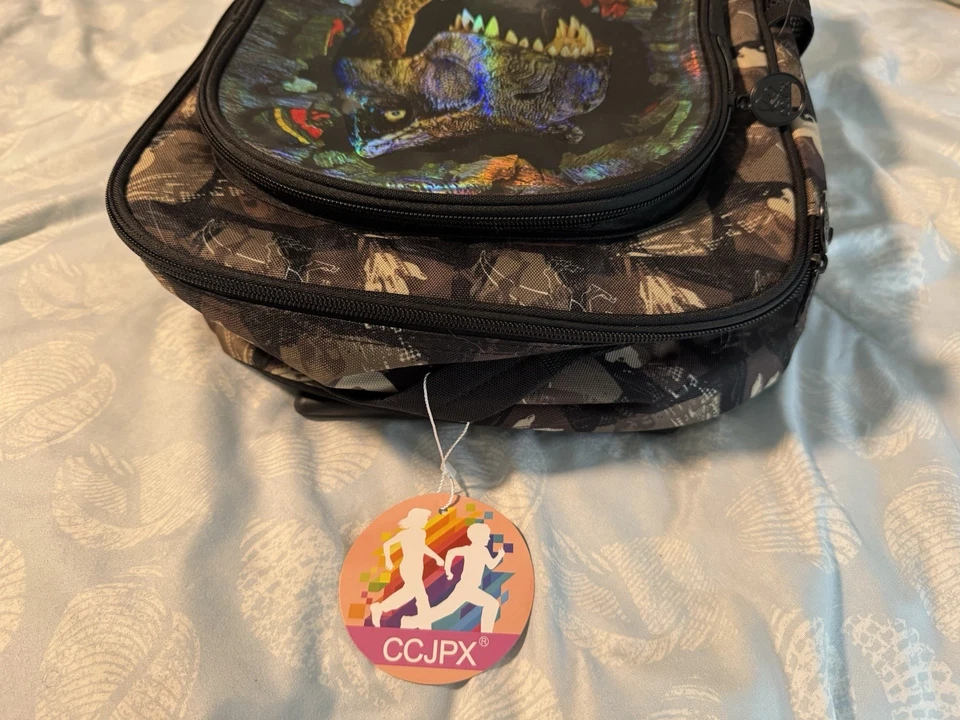 Equipaje con ruedas para niños Dinosaurio T Rex con página trasera para niños 3-5 hologramas negro Foto 2 de 4