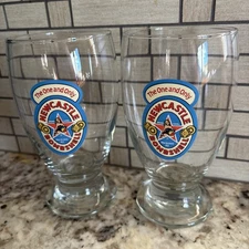 PAIR OF NEWCASTLE BOMBSHELL BROWN ALE 16 OUNCE BEER GLASSES