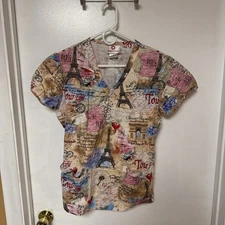 White Cross Scrub Top – Paris Eiffel Tower Print (M) – Used Good
