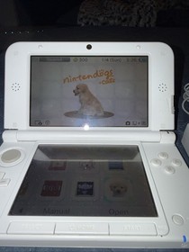 Nintendo 3DS XL Pink And White Handheld W/ Charger Pokemon Virtual Console Games