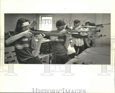 1985 Press Photo Junior marksmen aim for targets at National Rifle Association