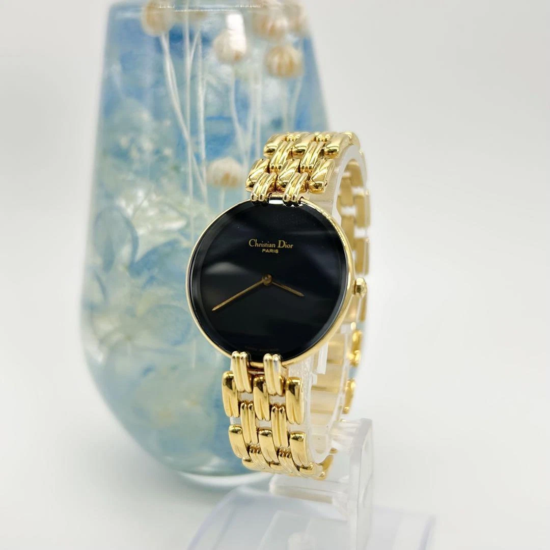 Montre Christian Dior Bagira plaqué or cadran noir bracelet 15 cm occasion