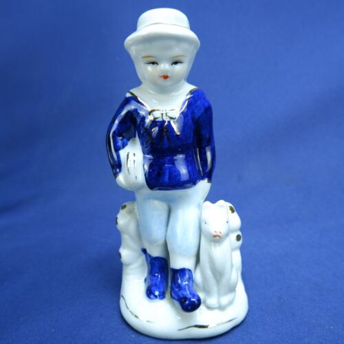 Figurine vintage en porcelaine céramique bleu garçon avec chiot style Delft fabriquée au Japon - Photo 1/5