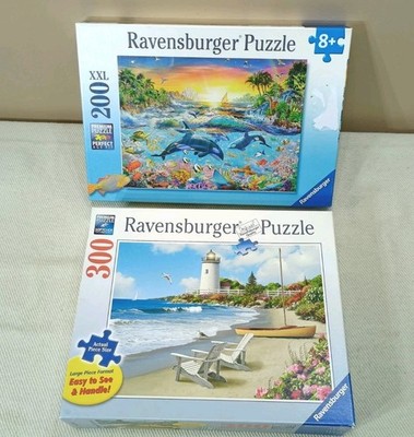 2 Ravensburger Puzzles 200 XXL, 300 pc Sunlit Shores Orca Paradies Complete
