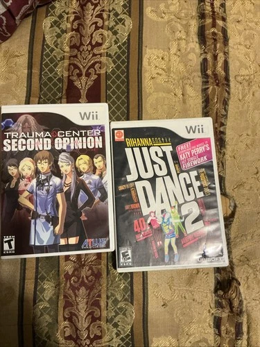New ListingTrauma Center: Second Opinion & Just Dance 2 Wii