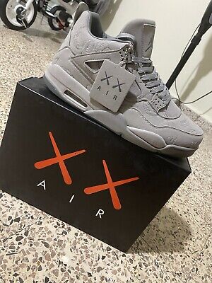Size 12 - Jordan 4 Retro x KAWS Cool Grey 2017 for sale Size 12 - Jordan 4 Retro x KAWS Cool Grey 2017 for sale