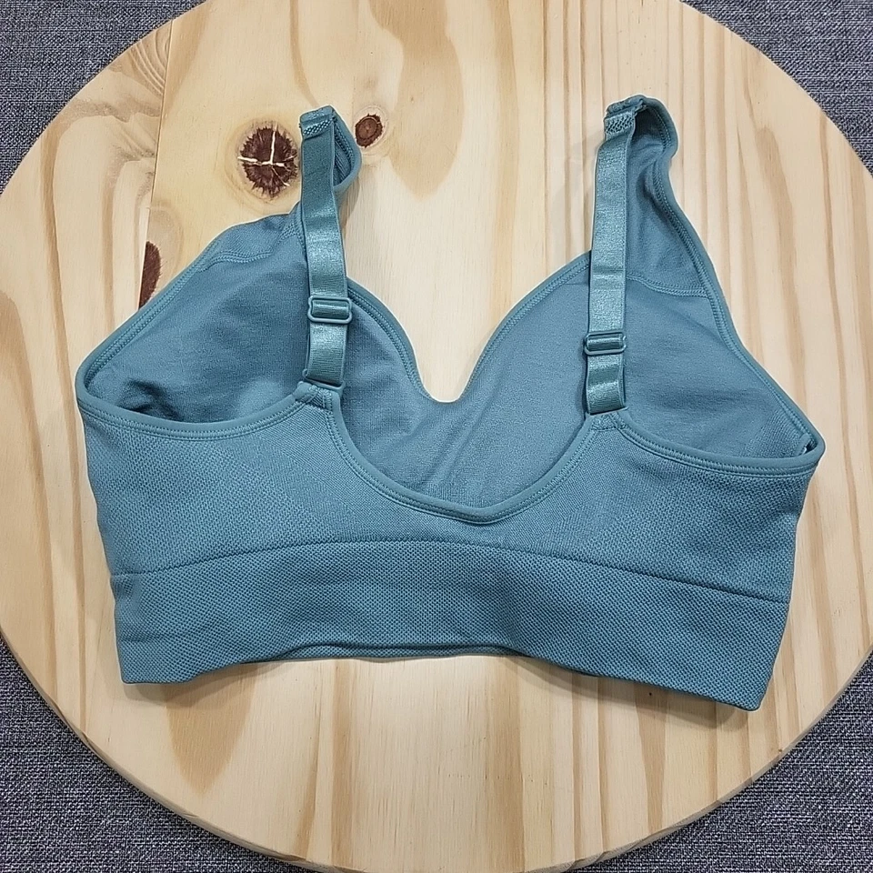 Sujetador deportivo sin costuras Puma para mujer copas extraíbles sujetador inalámbrico talla pequeña verde azulado Foto 3 de 4