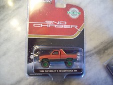 GREENLIGHT 1984 CHEVROLET K-10 SCOTTSDALE 4X4  DIRTY TRUCK GREEN CHASE