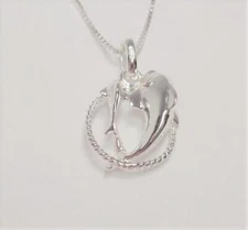 STERLING SILVER MAMA AND BABY DOLPHIN SWIMMING OVAL PENDANT NECKLACE