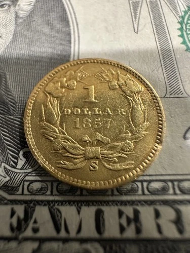 Photo of a 1857-S Gold Dollar from an eBay listing that sold on Jul 15, 2026