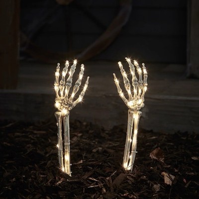 Creepy Cottage light up skeleton hand lawn stakes