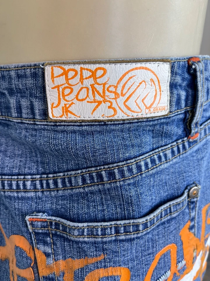 Minifalda vaquera Pepe Jeans UK 73 con pintura por goteo de graffiti naranja talla L Foto 4 de 4