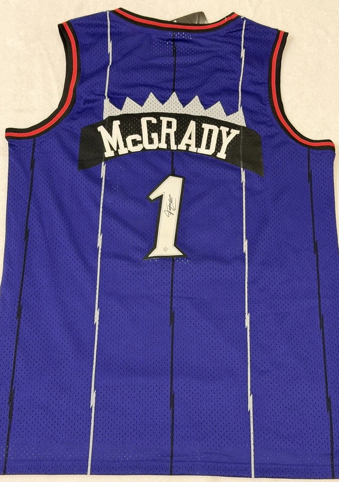 Camiseta deportiva de baloncesto firmada por Tracy McGrady de los Toronto Raptors de la NBA certificado de autenticidad Foto 4 de 4