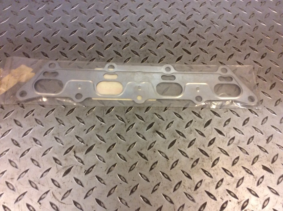 Junta colector escape 99-02 Saturn SC1 SC2 SL SL1 SL2 SW1 SW2 GM 21008079 Foto 2 de 4