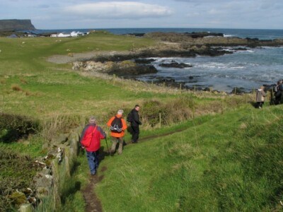 Photo 6x4 Approaching Dunseverick harbour Following the Causeway Coast Pa c2009