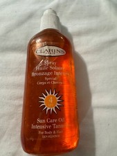 CLARINS SUN CARE OIL INTENSIVE TANNING SPF 4 FULL SIZE read