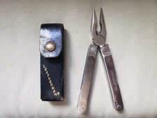 Vintage Leatherman multi tool with leather Sheath 