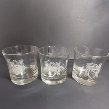 Jax Cafe cocktail glasses family crest etchings. Spencer, Simmons, Blaho.