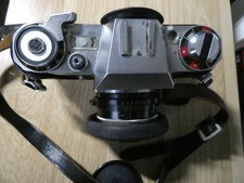 appareil photo argentique en très bon état