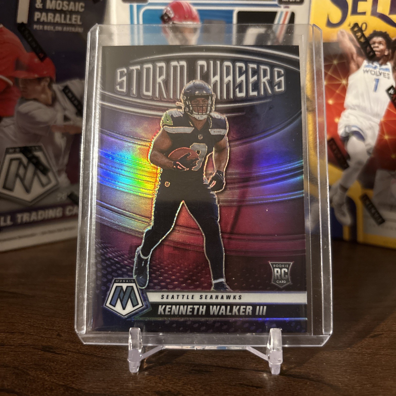 2022 Mosaic Kenneth Walker III Storm Chasers RC Prizm (Case Hit)