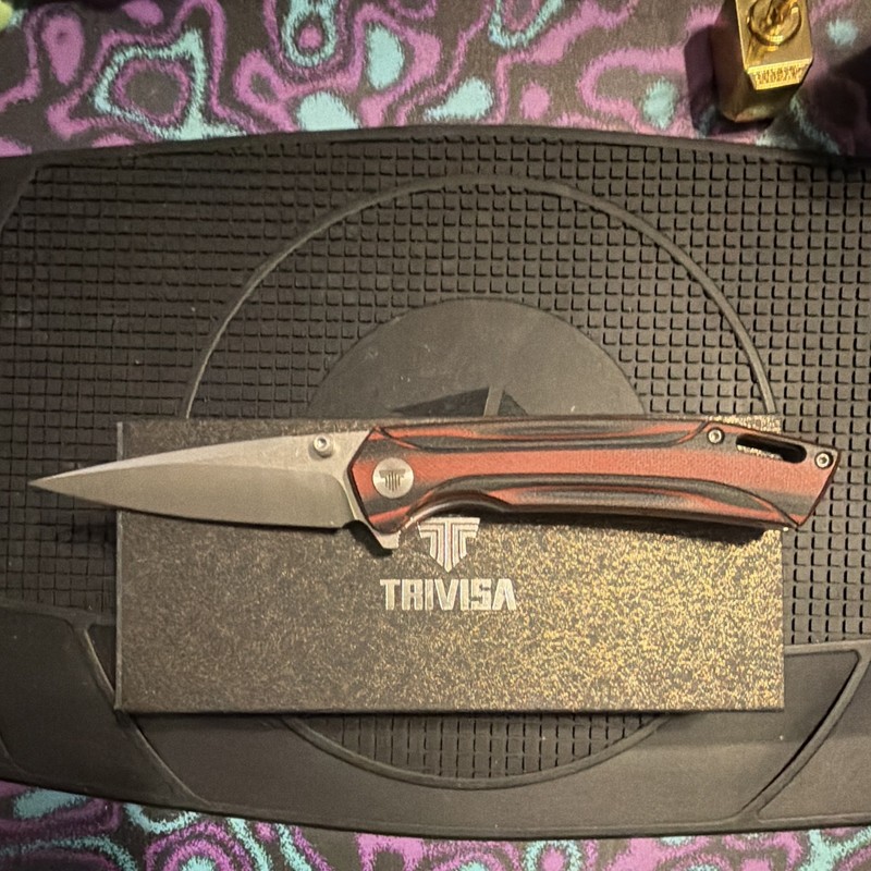 Trivisa Volans-03RB 154CM Red/Black G10 Manual Drop Point Liner Lock Clip