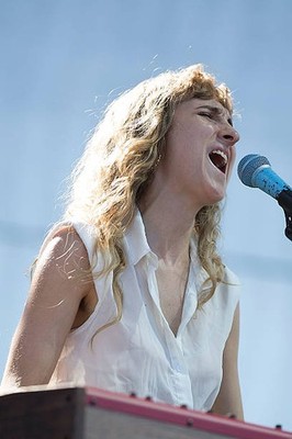 Musician Alaina Moore of Tennis performs on stage during day three- Old Photo 6