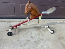 Antique Ride-On Horse Toy with Wooden Head and Metal Frame