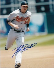 NOLAN REIMOLD   BALTIMORE ORIOLES   ACTION SIGNED 8x10