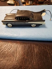 Vintage Telemania collectible 1957 Chevy car-shaped telephone.