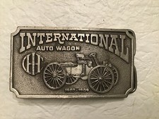 INTERNATIONAL AUTO WAGON CAST BELT BUCKLE
