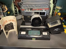 Minolta Hi-Matic E Rangefinder 35mm Film Camera 40mm F1.7 w/ Manual Flash