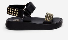 ASH - SANDALO DONNA IN PELLE NERA CON BORCHIE ORO E FONDO ALTO - VOLCANO