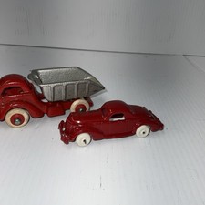 Early Pair Cast Iron Toys Hubley Cab Over Dump Truck And A Car Hauler Car