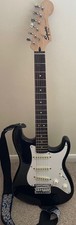 Squier by Fender Stratocaster guitar in good condition.