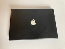 13  MacBook Vintage Black Beautiful, good condition, running Lion, small scuffs