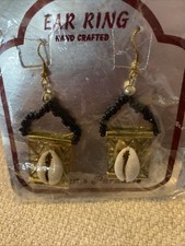 Beautiful Handmade Natural Cowrie Shell Earrings Elegantly made. 3 Inch Dangle 