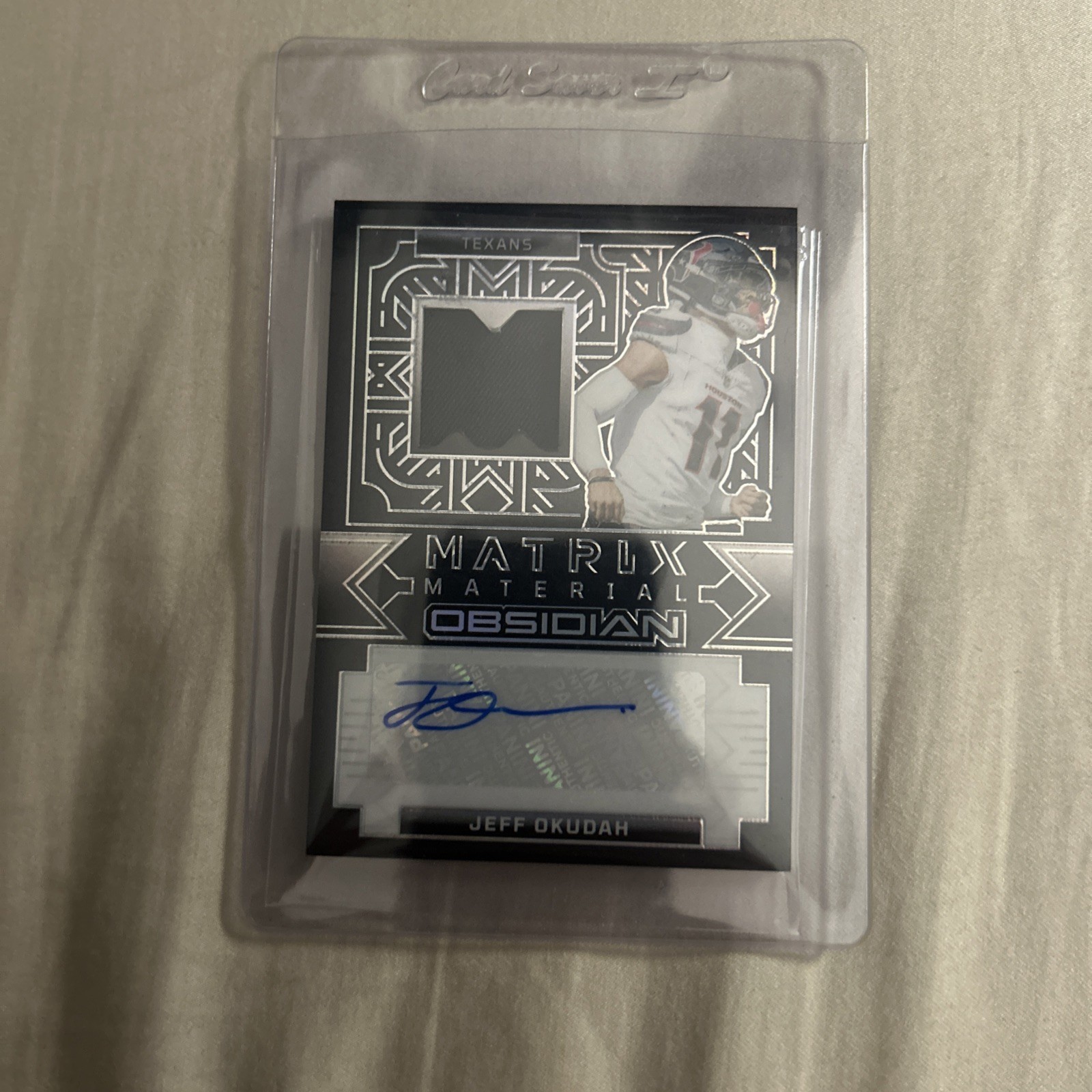 2024 Panini Obsidian - Matrix Material Autographs Jeff Okudah #MMA-JOH /299