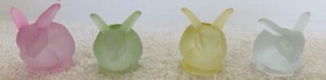 Pastel colored rabbit candle holders, set of four.