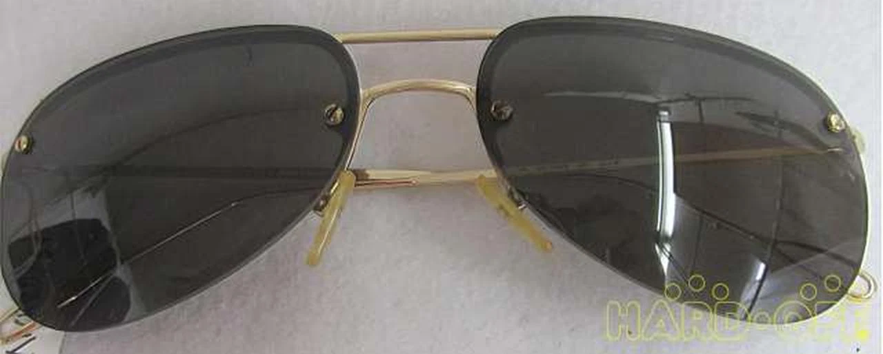 Lunettes de soleil authentiques Gucci accessoires pour hommes couleur or cadre métallique objectif noir