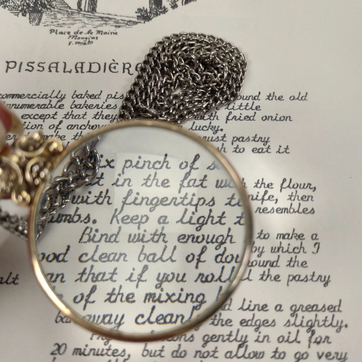 Avon magnifying glass best sale necklace