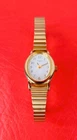 Women’s Vintage Timex Dress Watch,Stretch Band Gold Tone, Electric