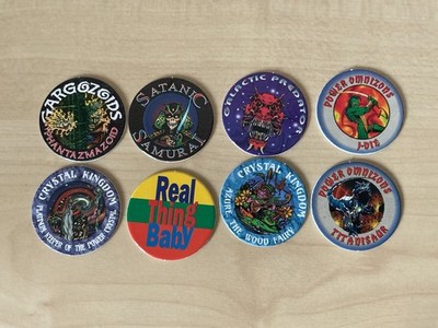 8 verschiedene 1994 Game Masters Milk Caps/ Pogs. Gebraucht. Sehr guter Zustand.