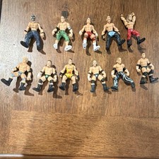 WWE Wrestling Action Figures Mixed Lot 11 Plastic Pieces Without Packaging