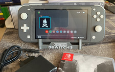 Nintendo Switch Lite Grise en boite + jeu Collector + Manette Pro + SD 32Go