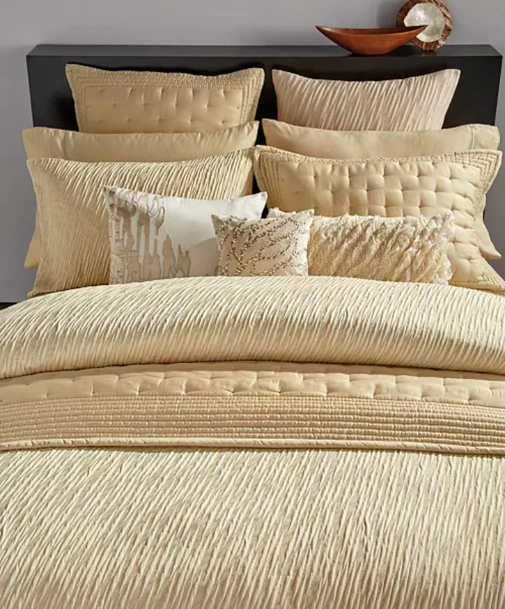 Almohada decorativa Donna Karan "polvo dorado" 11x22 Foto 4 de 4