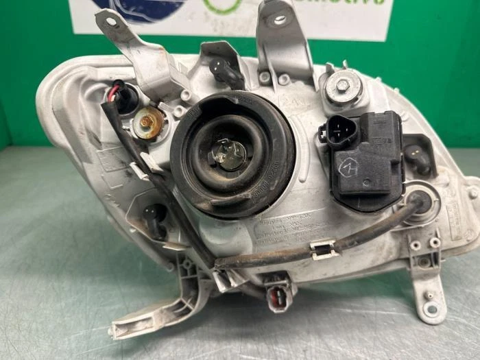 Hauptscheinwerfer links Daihatsu Cuore VI L251 10051731 P22676668 - Bild 3 von 3