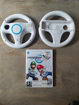 MARIO KART WII AND 2 x OFFICIAL STEERING WHEELS - GOOD CONDITION - Image 1 of 3
