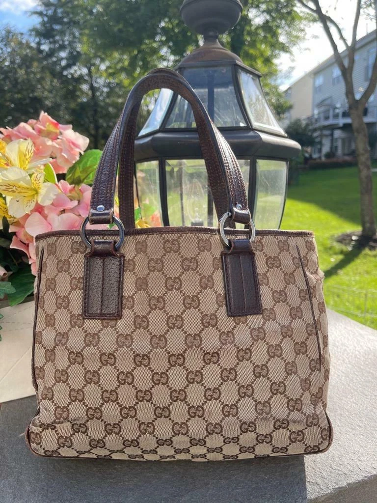 Gucci Brown GG Carnation Print Duffle Bag for Women